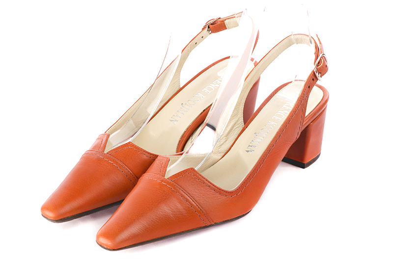 French elegance and refinement for these clementine orange dress slingback shoes, 
                available in many subtle leather and colour combinations. The pretty cut-out of the pump offers comfort and originality.
To be personalized or not, with your materials and colors.  
                Matching clutches for parties, ceremonies and weddings.   
                You can customize these shoes to perfectly match your tastes or needs, and have a unique model.  
                Choice of leathers, colours, knots and heels. 
                Wide range of materials and shades carefully chosen.  
                Rich collection of flat, low, mid and high heels.  
                Small and large shoe sizes